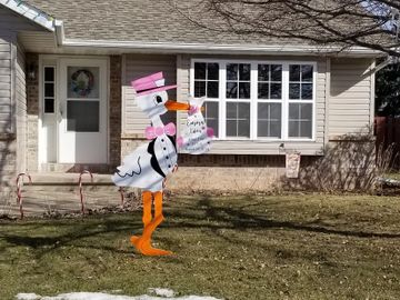 Yard sign stork birth announcement for girl