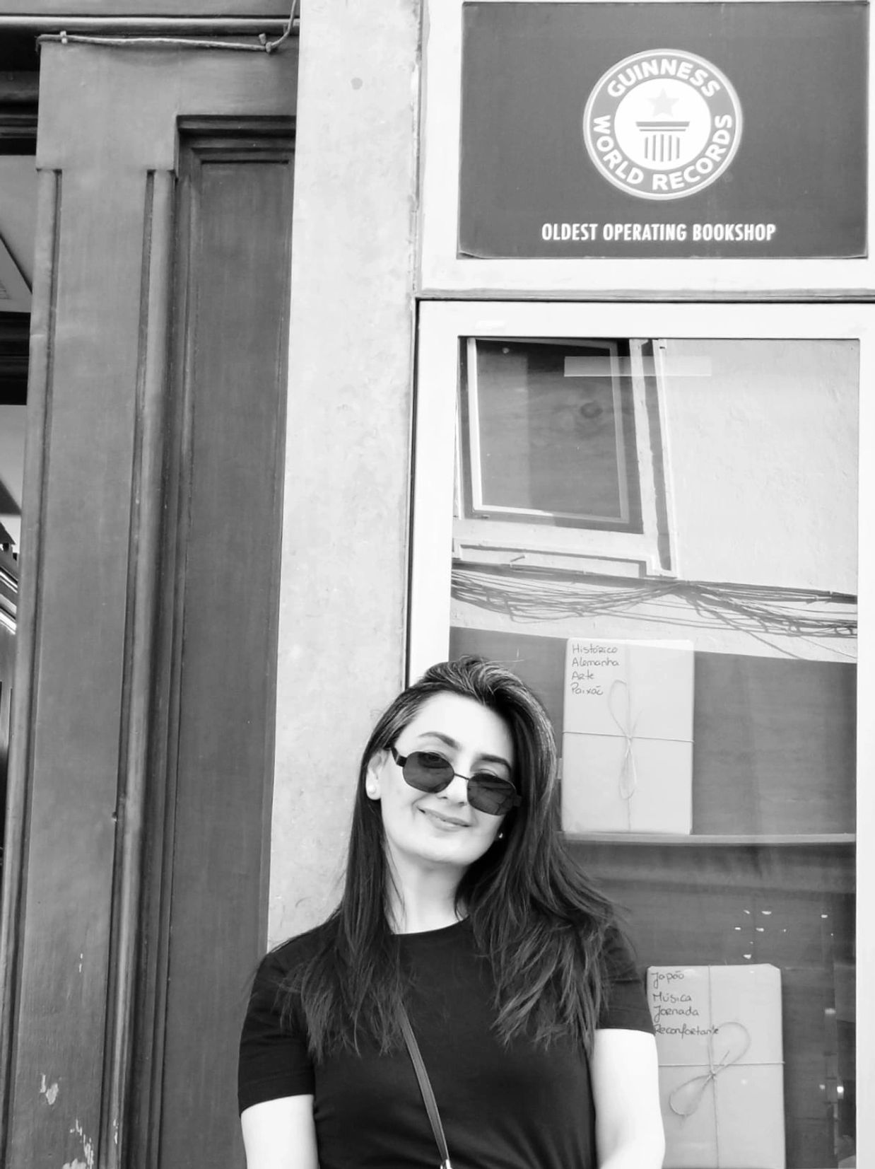 Standing infront of world's oldest operating bookstore, Livraria Bertrand Lisbon