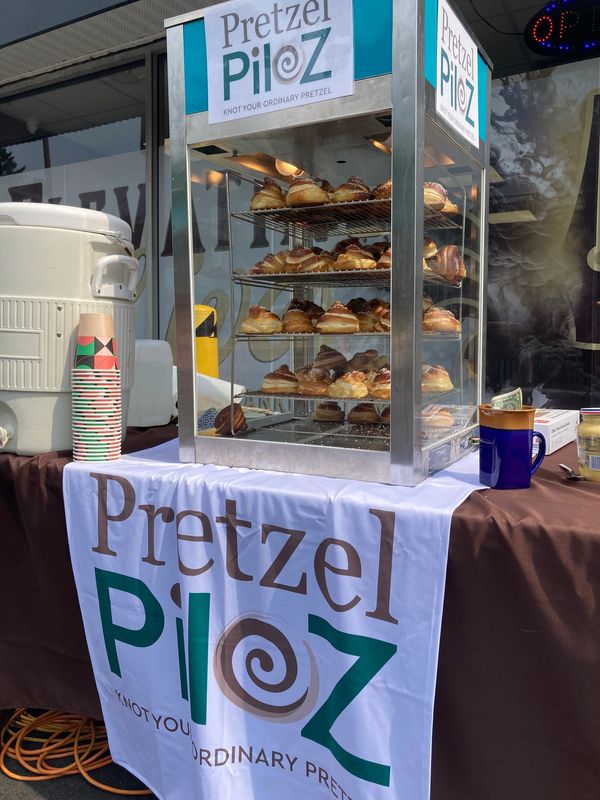 Display case filled with pretzels at Pretzel Piloz stand.