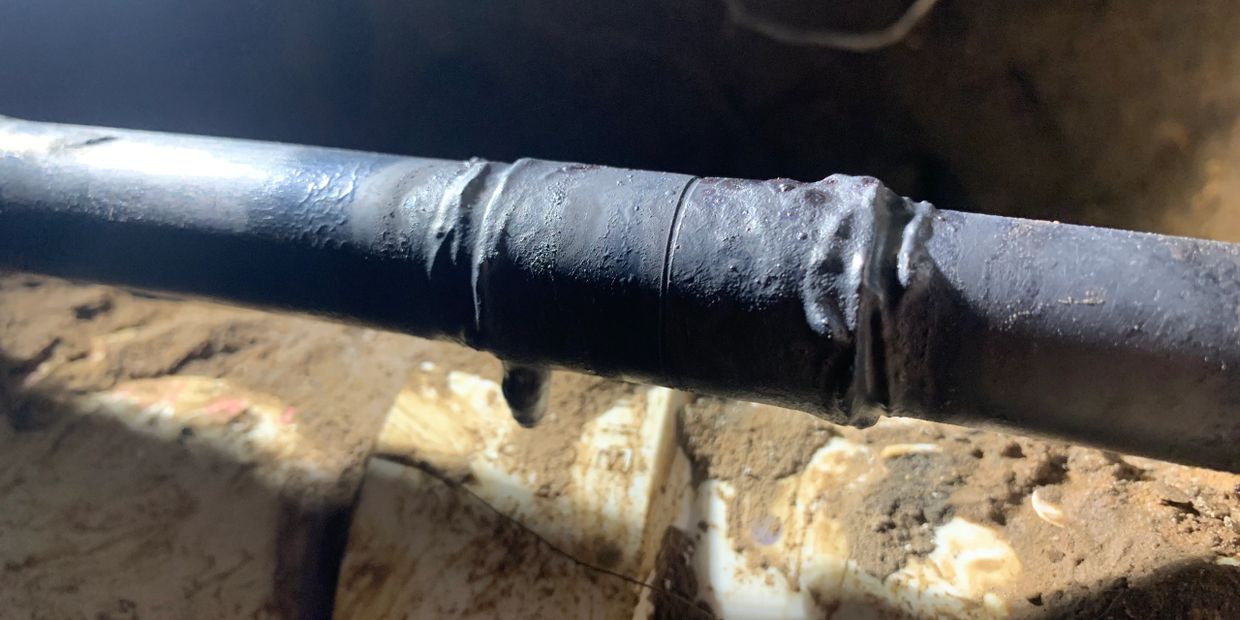 Copper pipe repair under concrete foundation, slab leak.