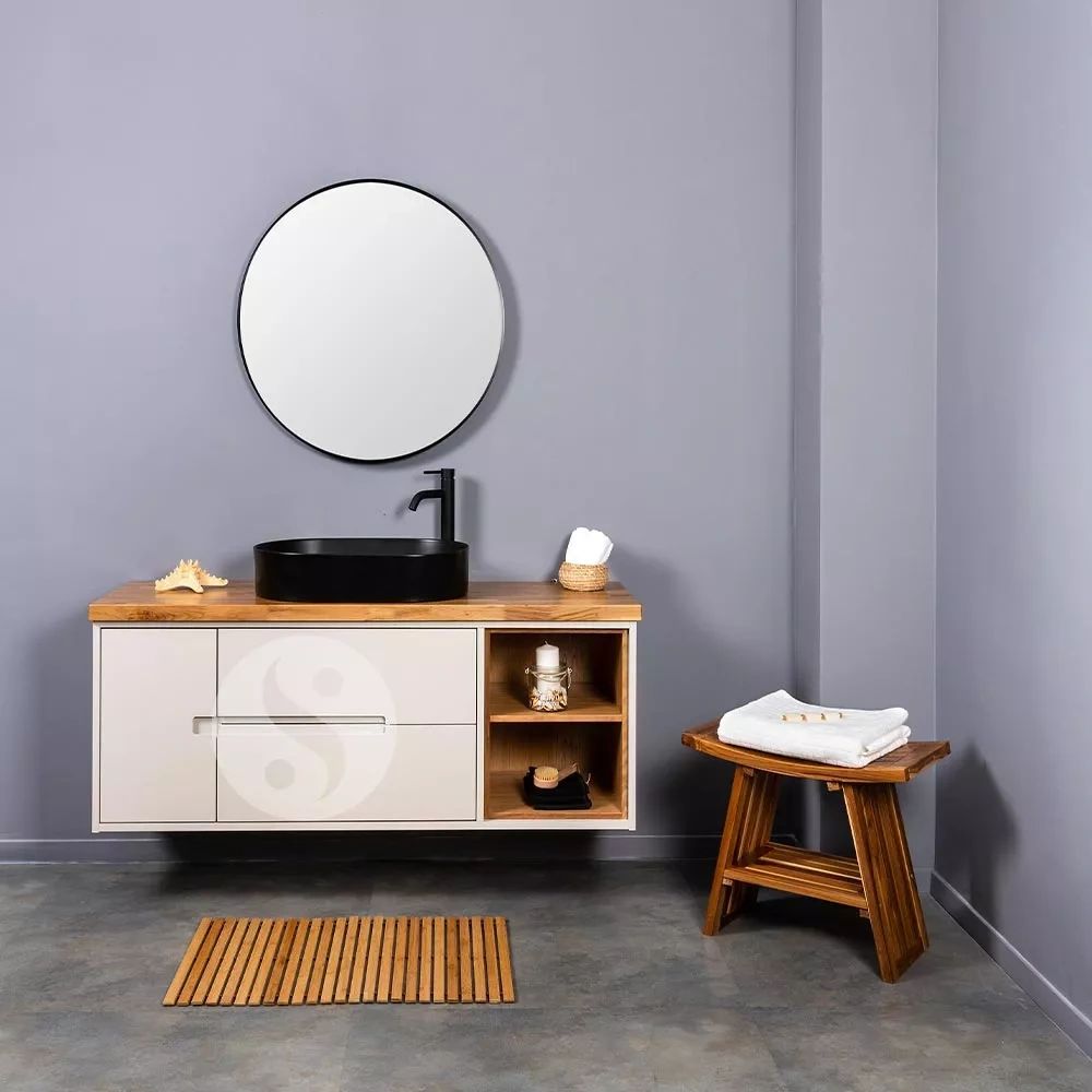 Minimalist bathroom setup with black sink.