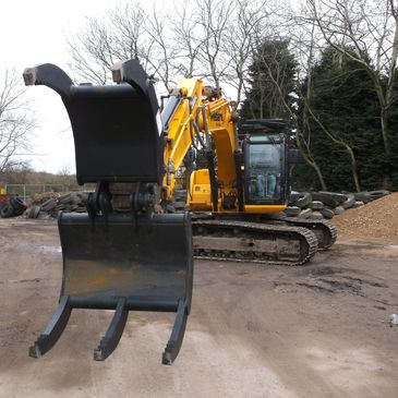 Abiljo solid leg economy grapple fitted to JCB JS220 