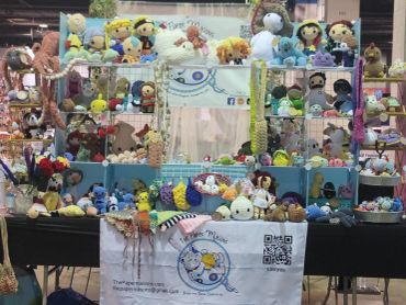 Booth with various plush toys.