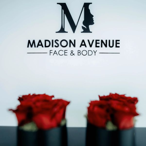 Madison Avenue Face and Body Miami front desk with roses