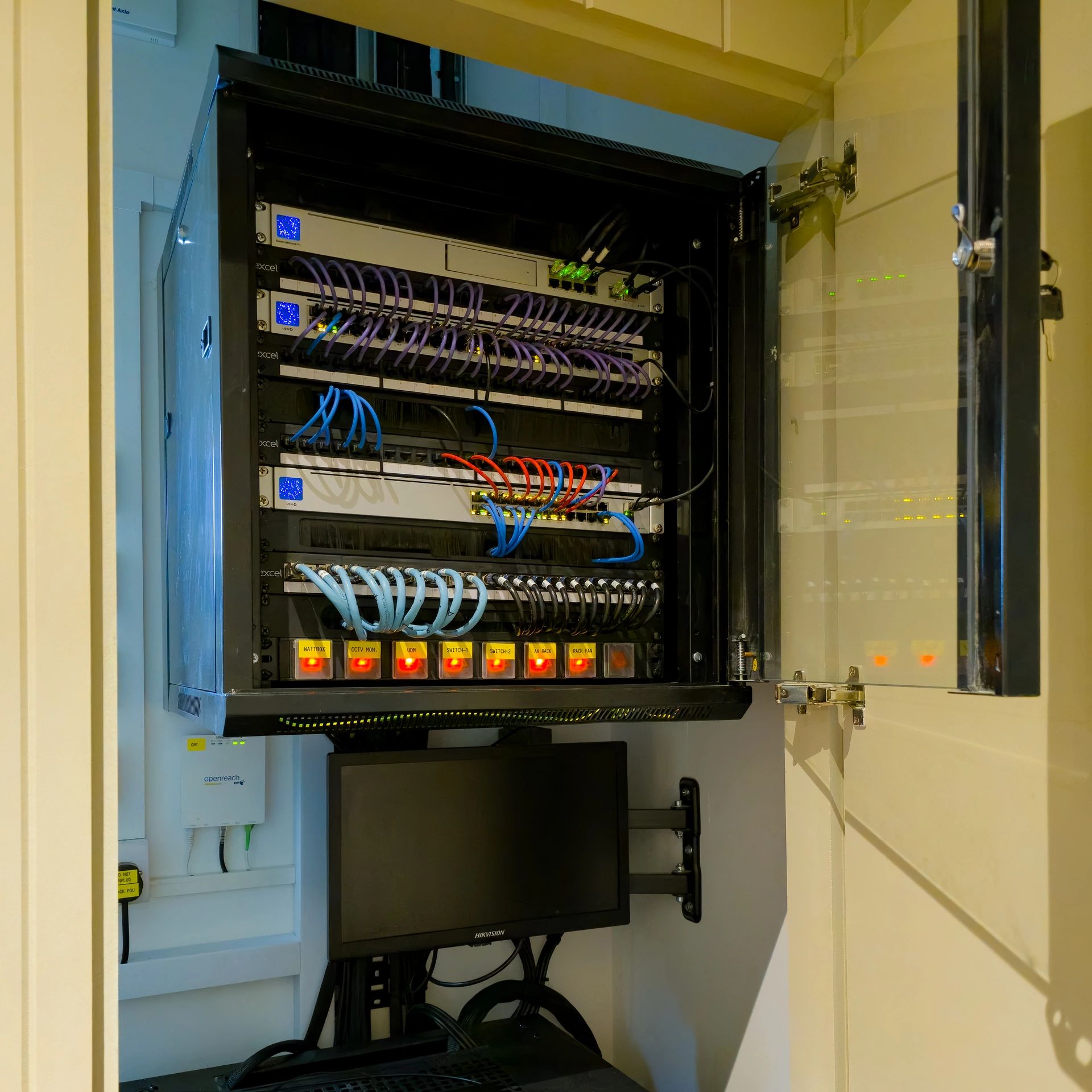 Data network termination rack showing house cabling infrastructure wired back to a central location 
