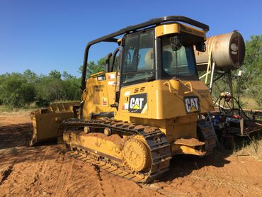 bulldozer dozer clearing roadways grading pads sub base