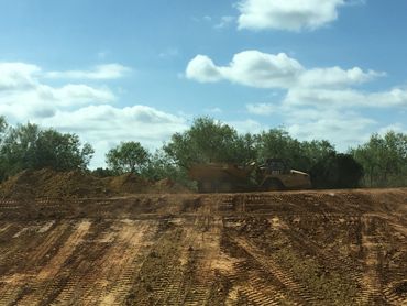 dump truck dirt work excavation grading road