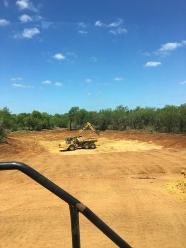 site work excavation digging pond tank
