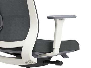 Close-up of a modern office chair's armrest and seat adjustment controls.
