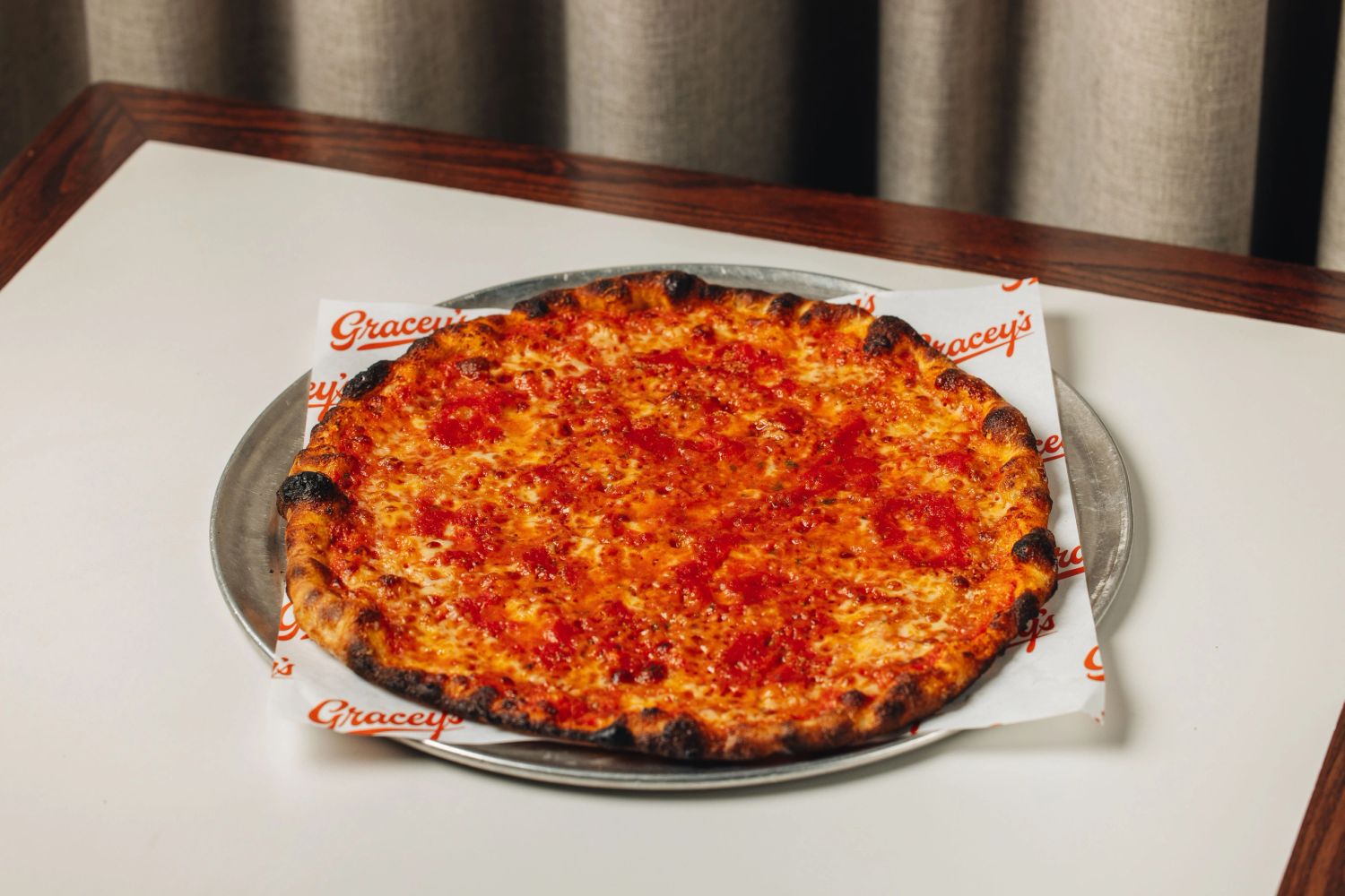 Thin and crispy charred pizza. 