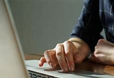 A man working on the laptop