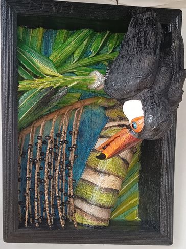 Quadro tucano comendo açaí