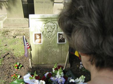 Janine Abeels at the grave of her brothers Roger Abeels and Gerald Sorenson in Ganshoren, Belgium. 