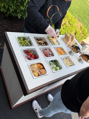 charcuterie savories on a mobile cart
