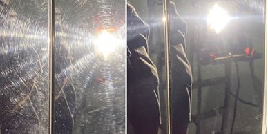 Comparison of a scratched and polished black surface under bright light.