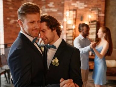 two men dancing a wedding dance at LGBTQ+ wedding