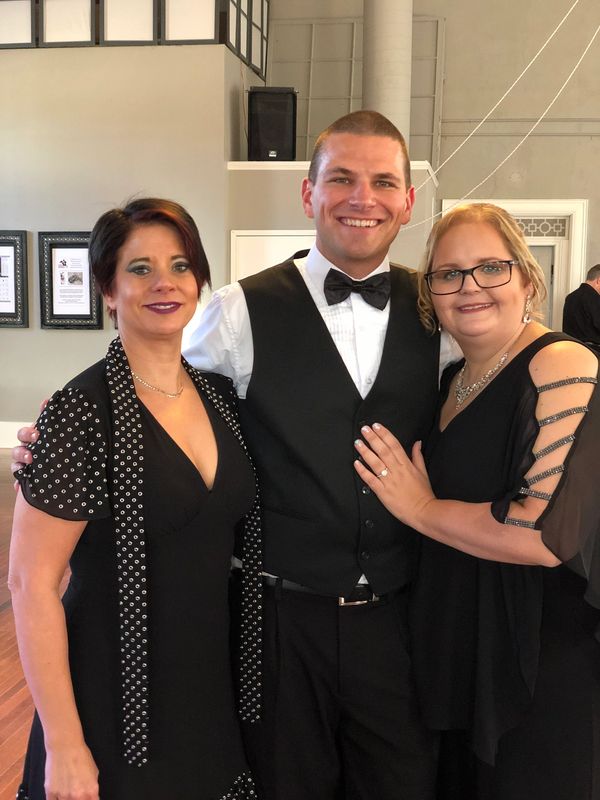 Laura Karasek Instructor and  newly engaged Tanda  Chris at the Miamisburg ballroom after a showcase