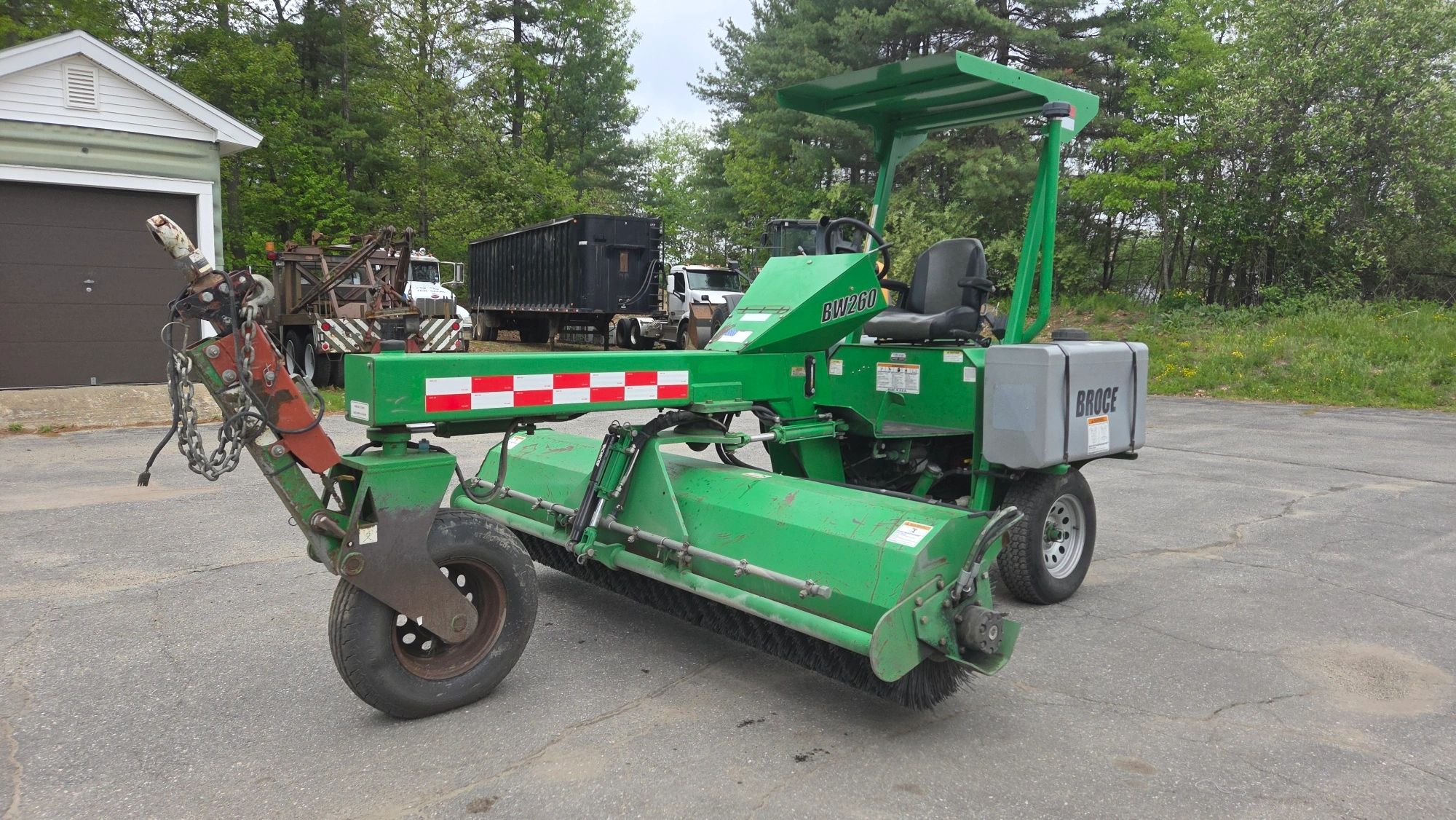 A green 2019 Lay-Mor SM300 tow-behind road sweeper listed for sale $11500 at Jaw Sales in Hollis NH