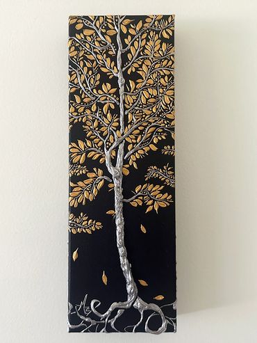Tall painting of a stylized tree with silver trunk and golden leaves on black background.