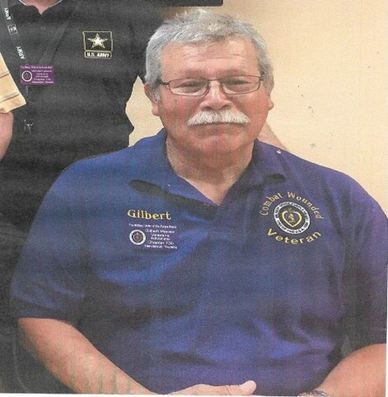 Man wearing a shirt that says Global Wounded Veteran.