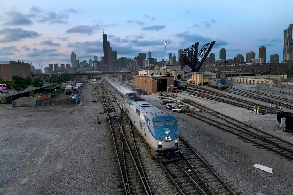 An Amtrak passenger train heading south out of Chicago on Wednesday evening.Credit...Charles Rex Arbogast/Associated Press