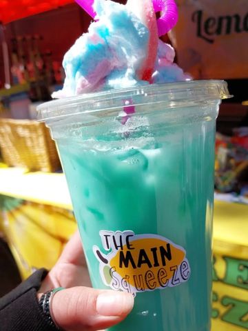 Italian soda topped with Cotton candy and peach ring