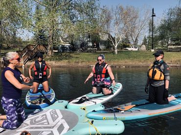 Paddle board rental SUP Yoga classes Calgary events outdoor activities paddleboard