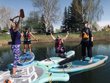 Paddle board rental SUP Yoga classes Calgary events outdoor activities paddleboard