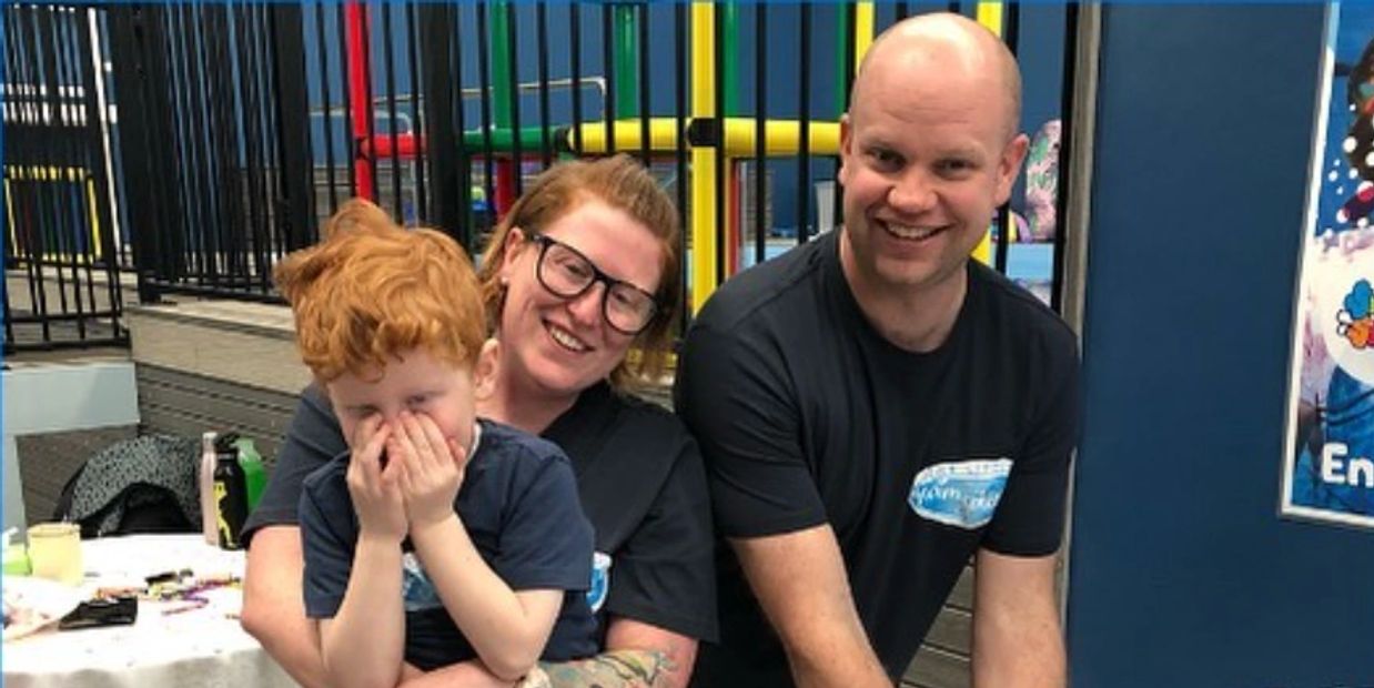 The owners of The Little Swim School smiling and laughing