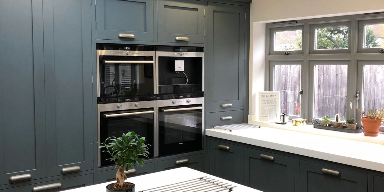 Kitchen extension, hand built cabinets, corian woktops