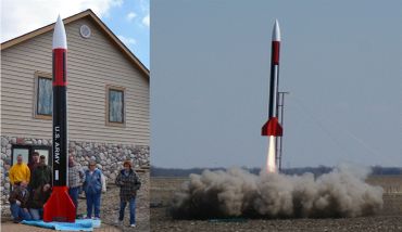 A model rocket with U.S. Army markings being launched in an open field.