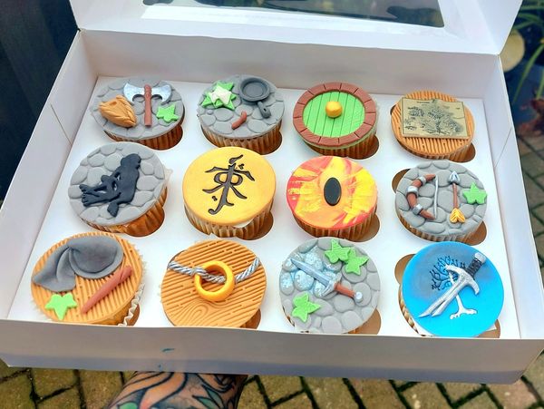 Box of 12 Lord of the Rings themed cupcakes.