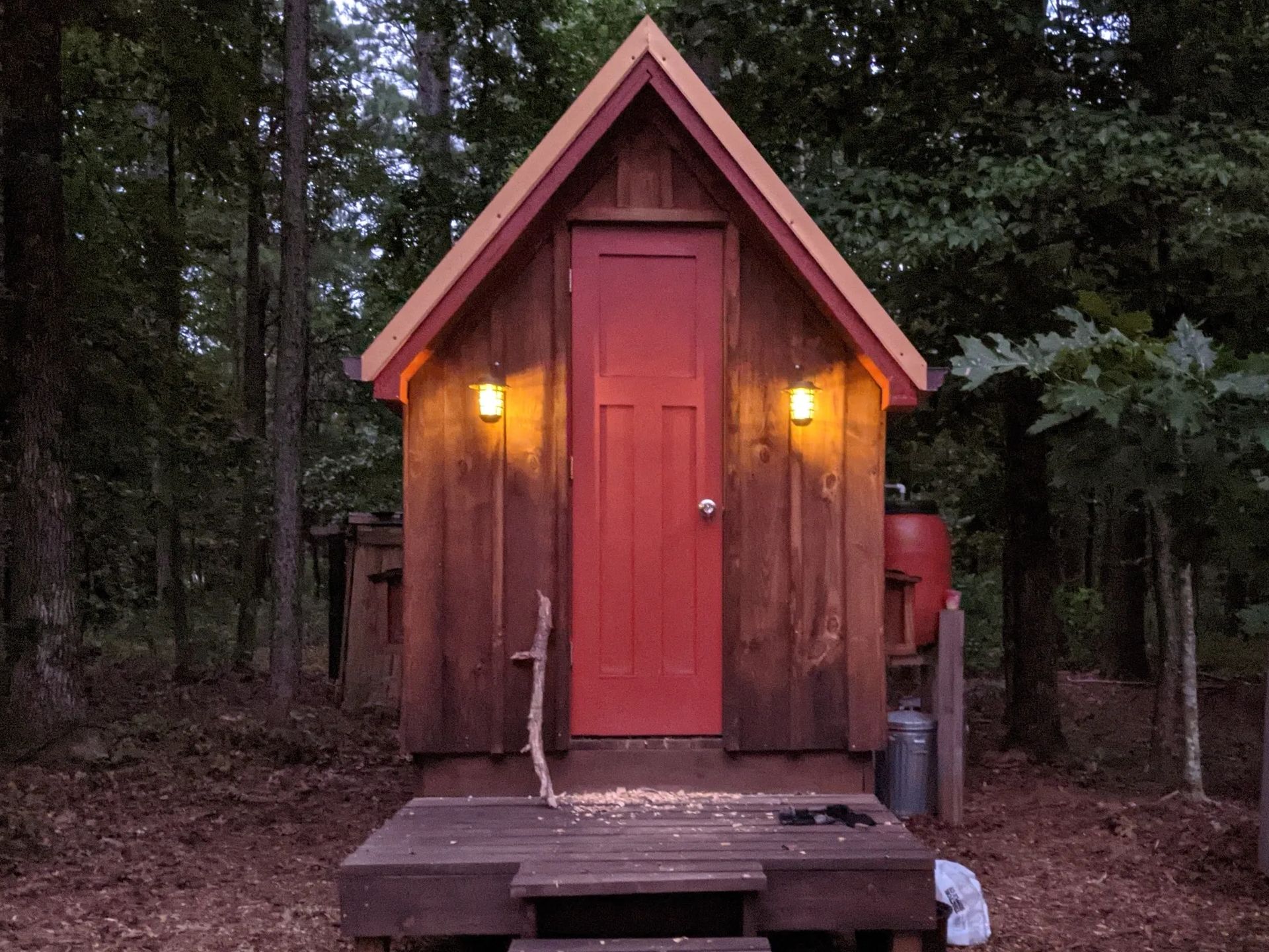 DIY Chicken coop
solar lights
rainwater
woods
metal roof
red skinny door