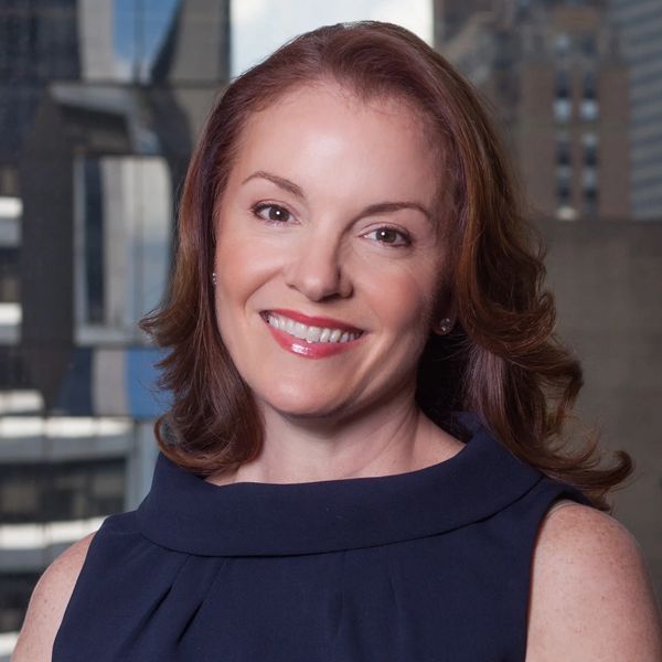 Professional headshot of Melissa Bradshaw-Mack, Houston-based GIA-certified private jeweler speciali