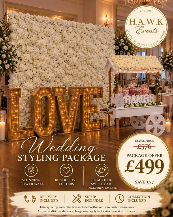 Elegant wedding styling with illuminated LOVE letters and floral decorations with a special offer 