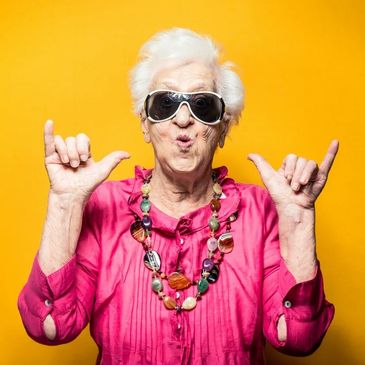 an elderly woman wearing glasses 