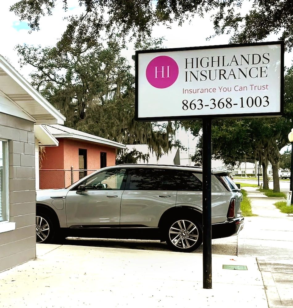 Sign for Highlands Insurance next to a parked SUV on a residential street.