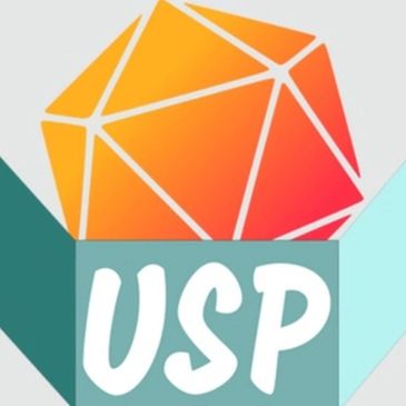 Orange geometric shape above USP letters in a teal box.