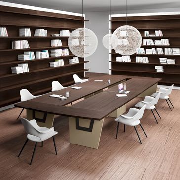 Modern conference room with wooden shelves and white chairs.