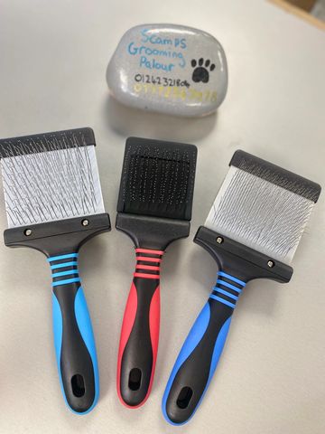 A section of dog slicker brushes we stock at Scamps and available to purchase 