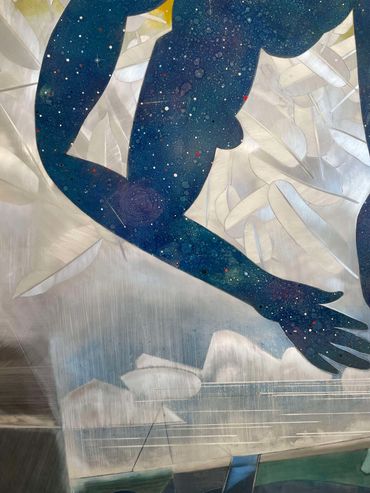 Mural of a dark silhouette with starry galaxy patterns.