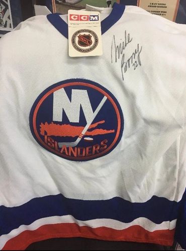 Signed Collectibles Store in Brooklyn, NY with Singed NY Islanders Jersey
