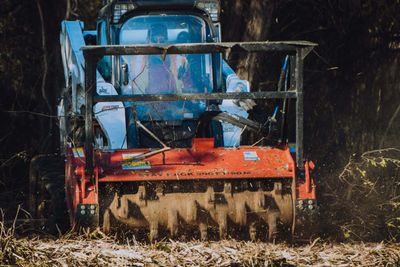 SKid Steer with Mulcing head. Fecon Bullhog