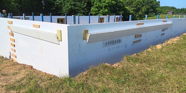 ICF walkout basement complete with brickledge for porch support.