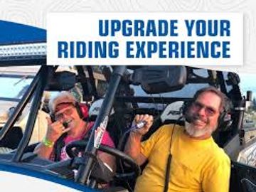 Two men enjoying a ride with communication headsets, promoting an upgraded riding experience.