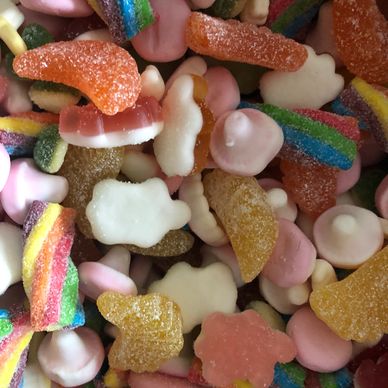 Colorful mixed gummy candies coated with sugar.