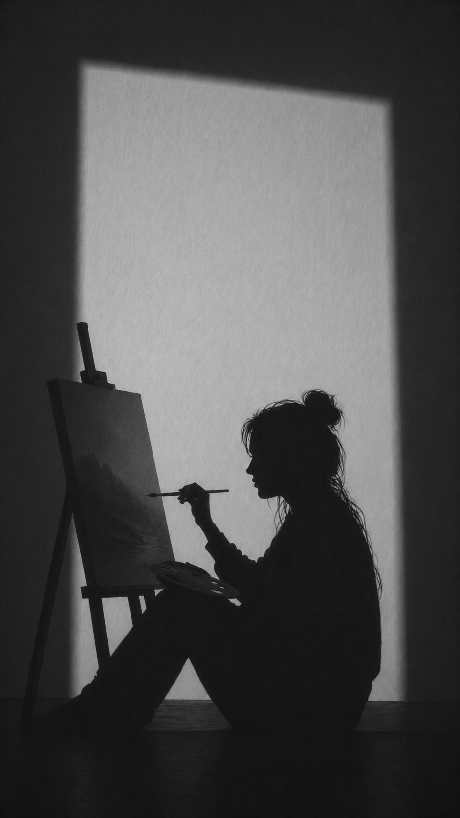 Silueta de una persona pintando.