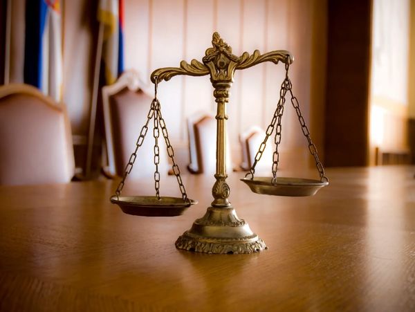 Scales of justice. Helping people with property & planning problems. Based at Thomas More Chambers.