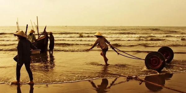 Sunrise fishing village people