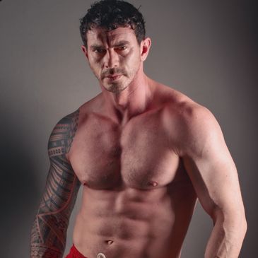 Male muscle in a studio setting 